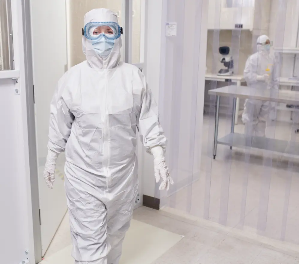 Cleanroom worker protecting a critical environment lab from contamination by wearing Lakeland CleanMax PPE